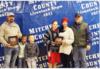 TOP DONORS -- Robbie and Missy Atkins were recognized by the Mitchell County Livestock Association for their support of the stock show. They were given buckles for the last year’s top donors.