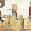 RECORD PHOTO
Colorado ISD’s Assistant Superintendent Denise Farmer (left) and Superintendent Reggy Spencer have shopped and are now assembling the gift bags made specifically for students of the district.